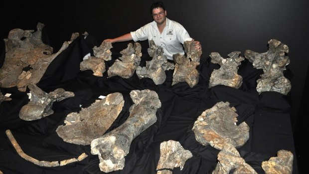 Stephen Poropat with the fossilised remains of Savannasaurus elliottorum - found in Queensland.
