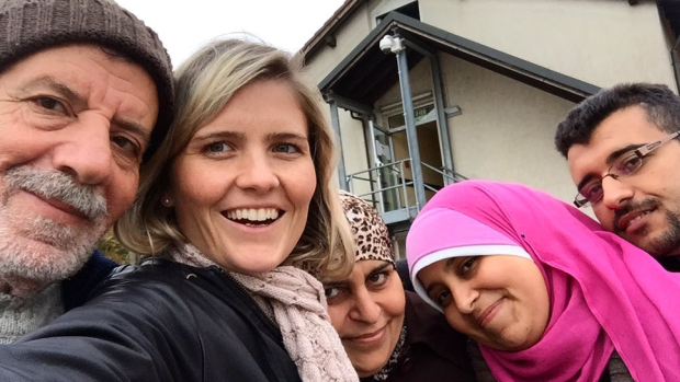 ABC journalist Sophie McNeill with Syrian refugee Nazieh Husein and his family, reuinted and safe in Germany. 