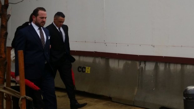 Adrian Mark Crowther, 45, right, leaves court with defence lawyer Peter Woodhouse.