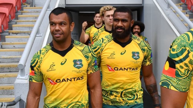 Aboriginal pride: Kurtley Beale models the Indigenous jersey before the captain's run at Suncorp Stadium.