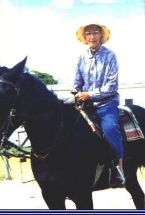 Evelyn Vigor riding a horse in her 80s.