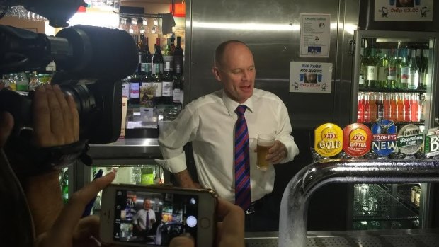 Just a quiet beer in front of a media pack and accompanying cameras.