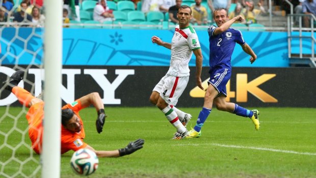 Avdija Vrsajevic fires in Bosnia's third goal.