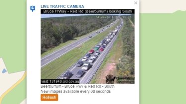 fire delays causing bruce highway long car glasshouse traffic mountains camera kilometres three road south red