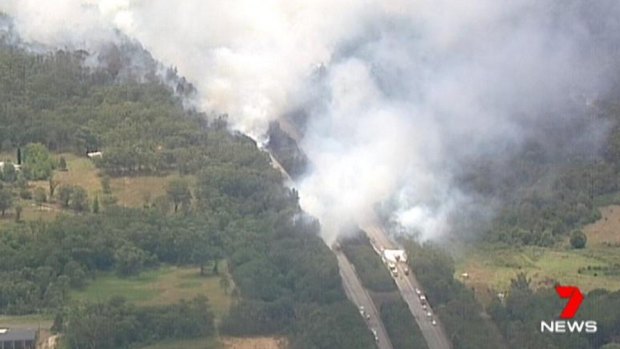 The fire spread to bushland on either side of the motorway, burning 15 hectares of bushland.
