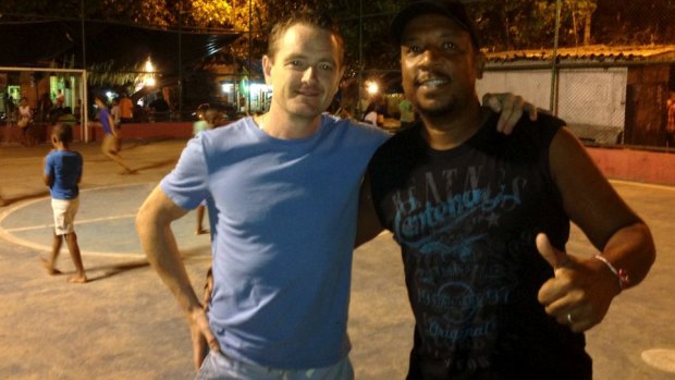 Love of the game: Conor Hartnett and Carlao in the favela.