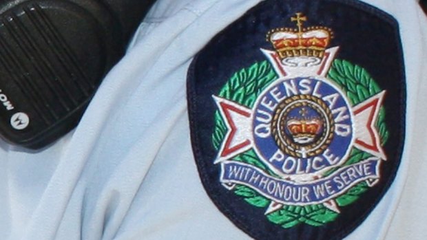 Officers have had their pay cut over a nude photo taken in Fortitude Valley.