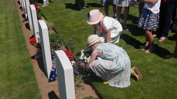 Australians lay flowers in memory of those lost at Fromelles.