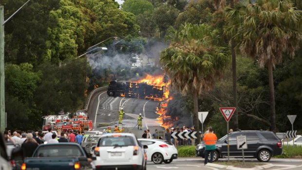 Fireball: The tanker on its side on Mona Vale Road on October 1, 2013.