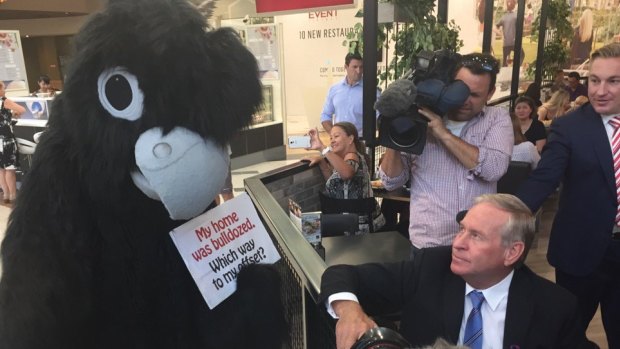 Colin Barnett was heckled by a Roe 8 cockatoo protester in the days before the election.