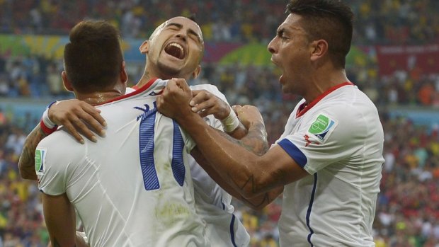 Chile's Eduardo Vargas celebrates after scoring the opening goal.