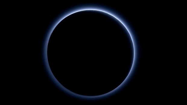 The blue-tinged atmosphere of Pluto as taken by the New Horizon probe.