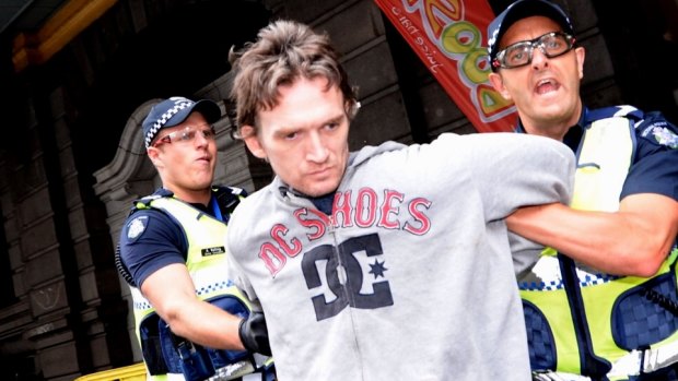 This man was arrested as police moved to remove the homeless people from Flinders Street