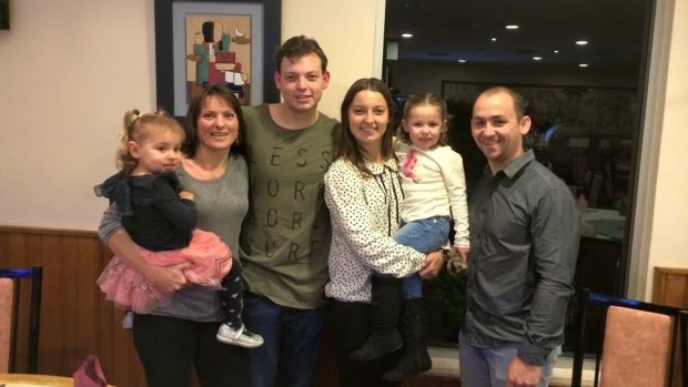 Joel and Angela Hudson of New Lambton with their children.