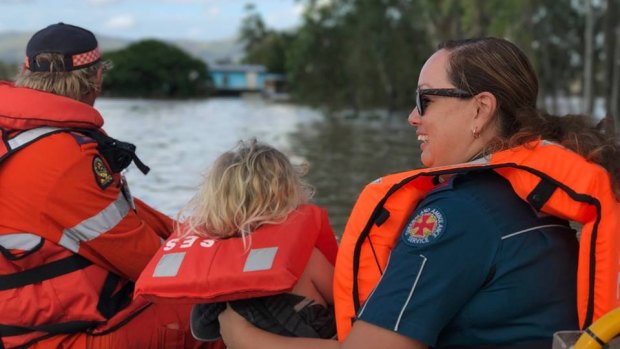 Paramedics used a boat to reach a girl at Rockhampton who had spilt boiling water on herself on Thursday.