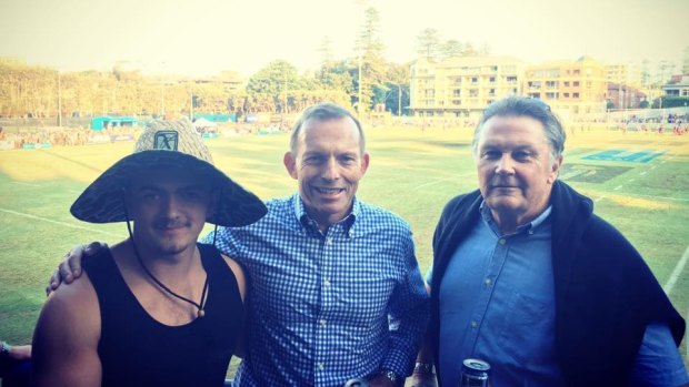 A fan meets Tony Abbott and his former campaign manager Ian Macdonald.