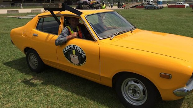 Sam Xuereb in his 1974 Datsun 120Y.