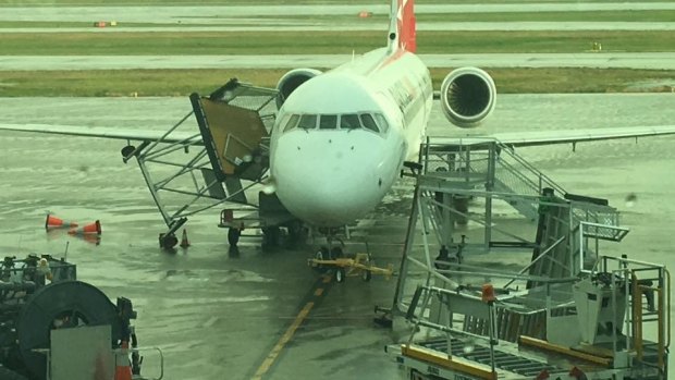 Winds wreaked havoc at Brisbane Airport as a storm hit Brisbane's north on Sunday.