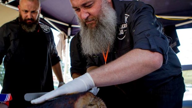 Going all out to win: Entrants in the Meatstock Festival's barbecue competition in Sydney last year. 