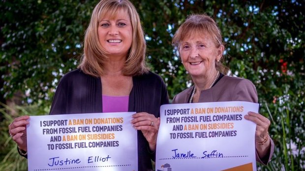 Labor's Justine Elliot and Janelle Saffin have broken ranks with party policy to support a push to ban mining donations and fossil fuel subsidies.