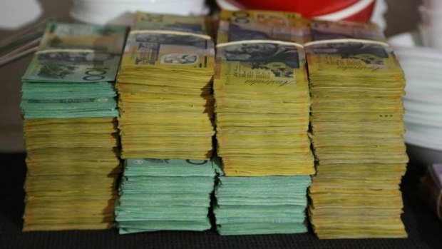 Police seized almost $400,000 from the homes of the men.