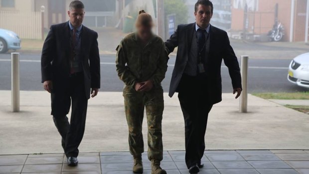 An Australian Defence Force airwoman was arrested on Thursday over an alleged bank robbery.