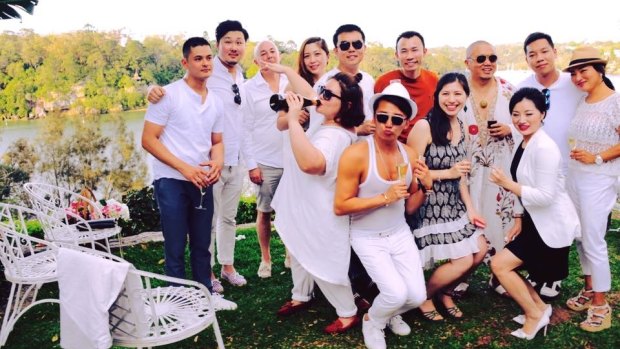 Guests posing at the White Party of Chinese Gatsby Sam Guo at Hunters Hill.