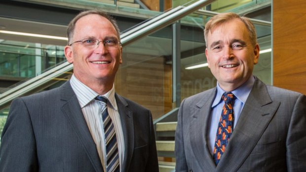 Aspen Medical's Glenn Keys (left), with Dr Andrew Walker in Canberra, believes firms must look for new, more efficient ways of delivering health services.