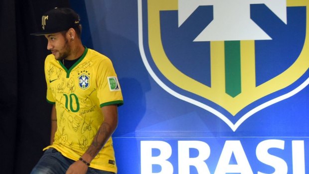 Composed: Neymar arrives at the media conference.