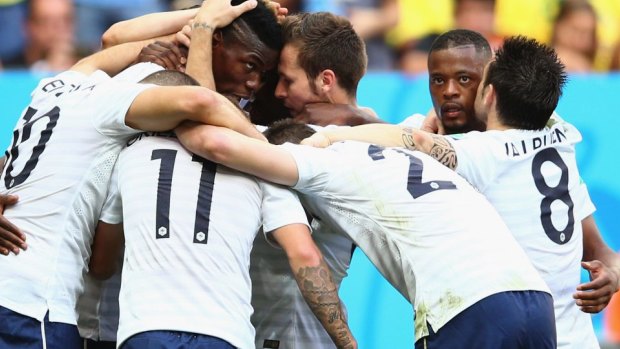 France players celebrate Paul Pogba's opening goal.