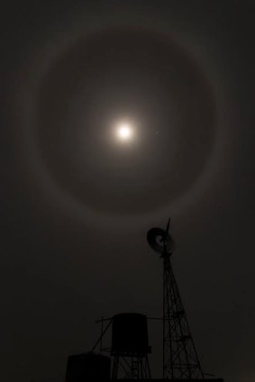 The combination of a full moon and cirrus clouds in the upper atmosphere provided an incredible spectacle in the night sky on Saturday night, with a moon ring visible to most Australians.