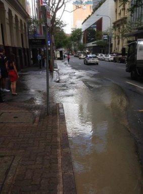 Water on Charlotte Street that has forced the closure of the Queensland Health building for the day.
