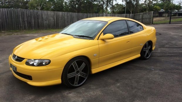 The yellow Holden CV8 Monaro Turbo involved in the crash at Queensland Raceway.