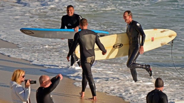 The surfers were "pretty buzzed" by their close encounter. 