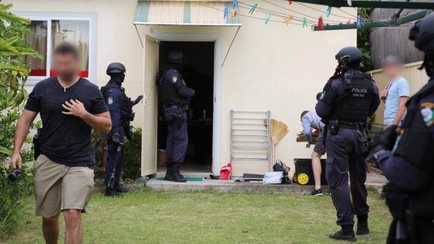 Police searched homes across Sydney on Wednesday. 