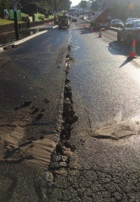 A large crack could be seen on Lane Cove Road after the water main burst.