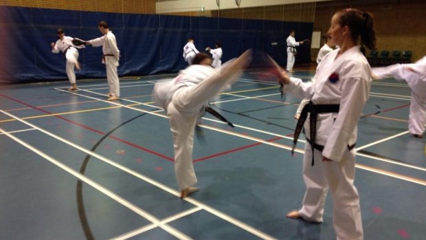 Sparring fun: Training at United Taekwondo Canberra. 