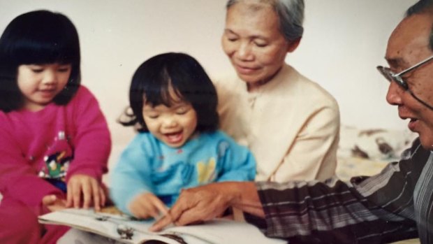 Giselle (centre) with her sister Cybelle, her Bà Nội and Ông Nội. 