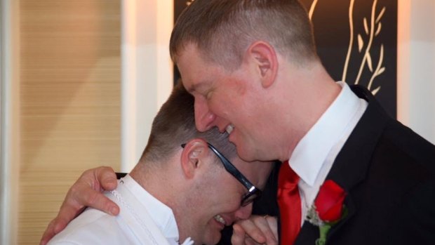 Stephen Page (right) with husband Mitchell Page at their Vegas wedding.