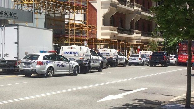 Police descended near William Street in Perth's CBD. 
