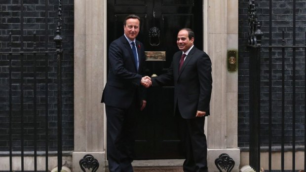 British Prime Minister David Cameron greets Egyptian President Abdel Fattah al-Sisi at 10 Downing Street.