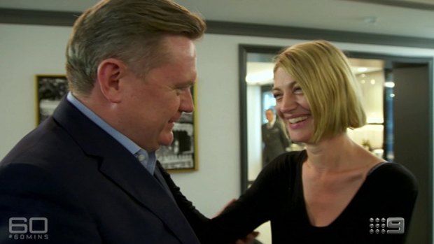 Michael Usher greets colleague Tara Brown at the beginning of a 60 Minutes interview on Lebanon.