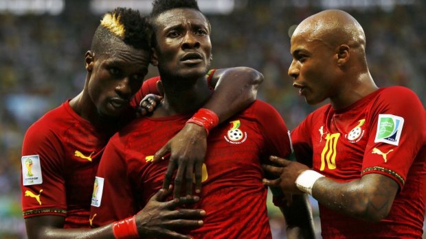 Ghana's Asamoah Gyan, centre, had fired Ghana into a 2-1 lead.