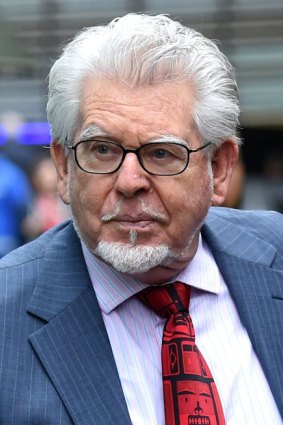 Accused: Rolf Harris faces 12 charges of indecent assault against four girls.