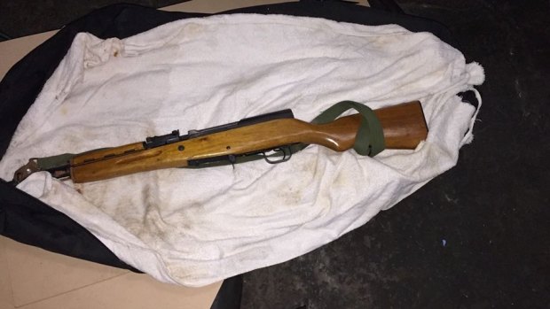 A gun seized by police during property raids this week.