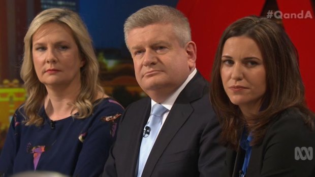 Senator Mitch Fifield, centre, copped criticism on behalf of colleague Peter Dutton on <i>Q&A</i>.