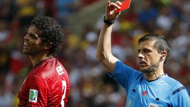 Portugal's Pepe is shown the red card by referee Milorad Mazic