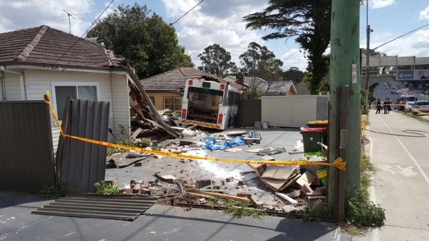 A bus crashed into two homes on Epping Road, North Ryde on Saturday.