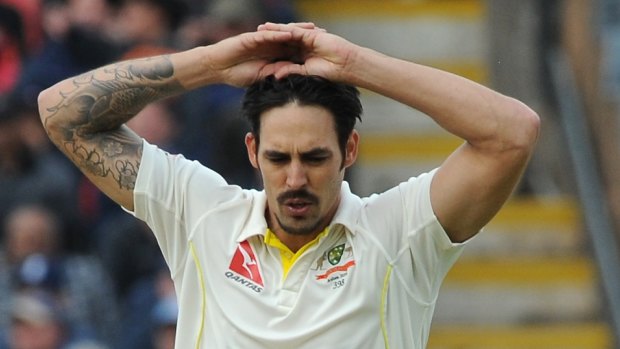 Poor performance ... Australia's Mitchell Johnson raises his hands during a frustrating day for our fast bowlers.