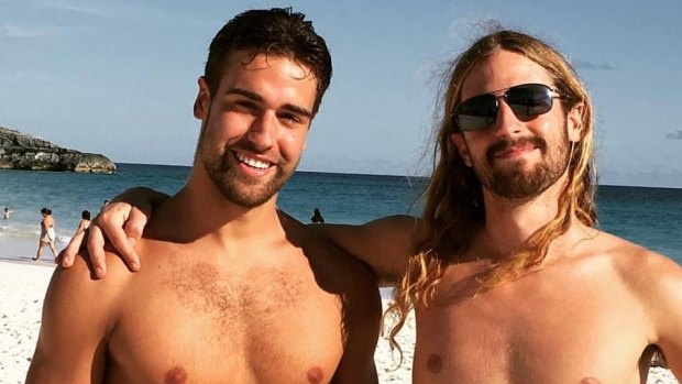 Endicott Ackerman, 20, (left) is missing after he was spotted diving into rough seas at Bondi Beach on Monday.